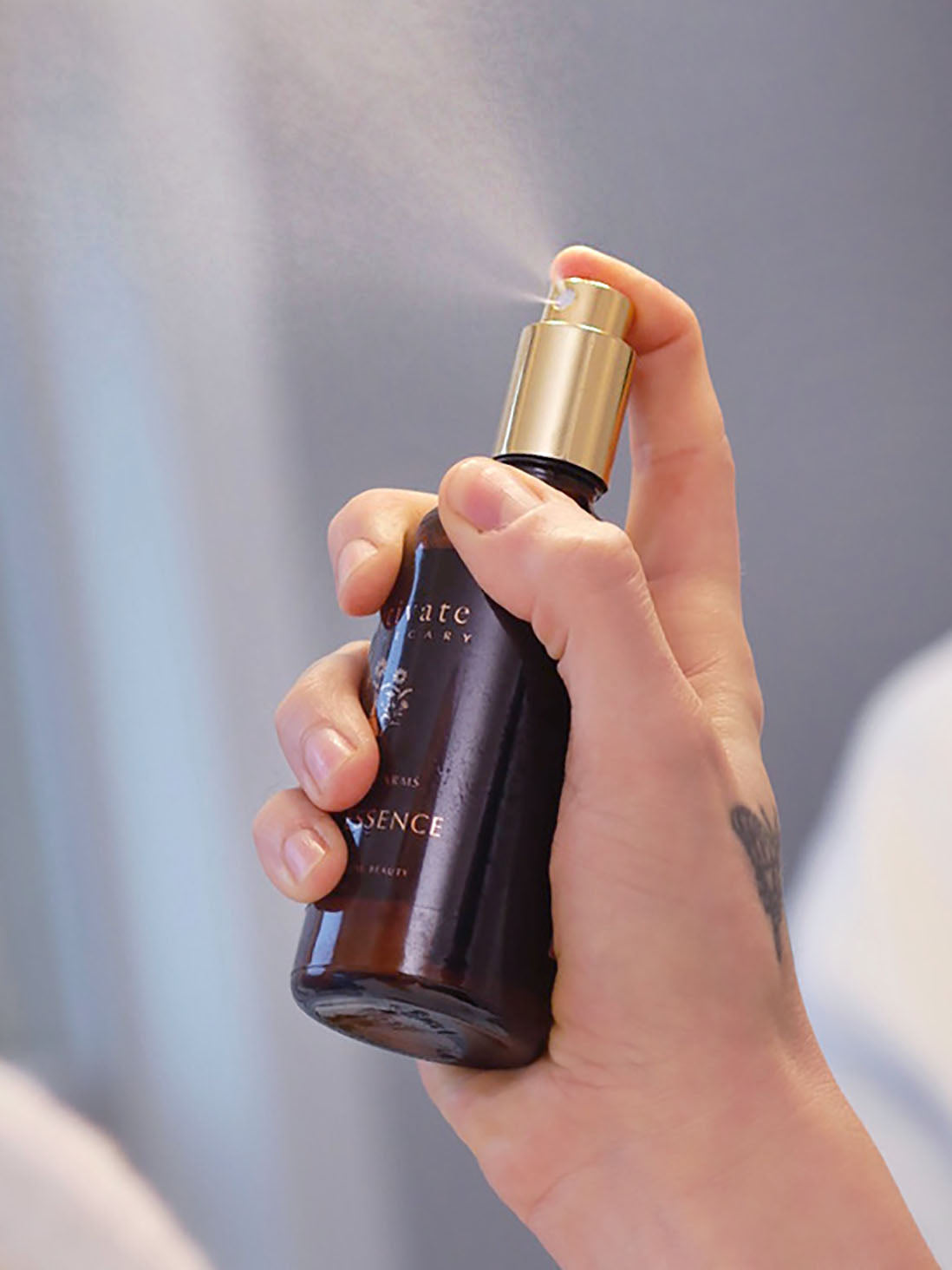 botanical toner being sprayed