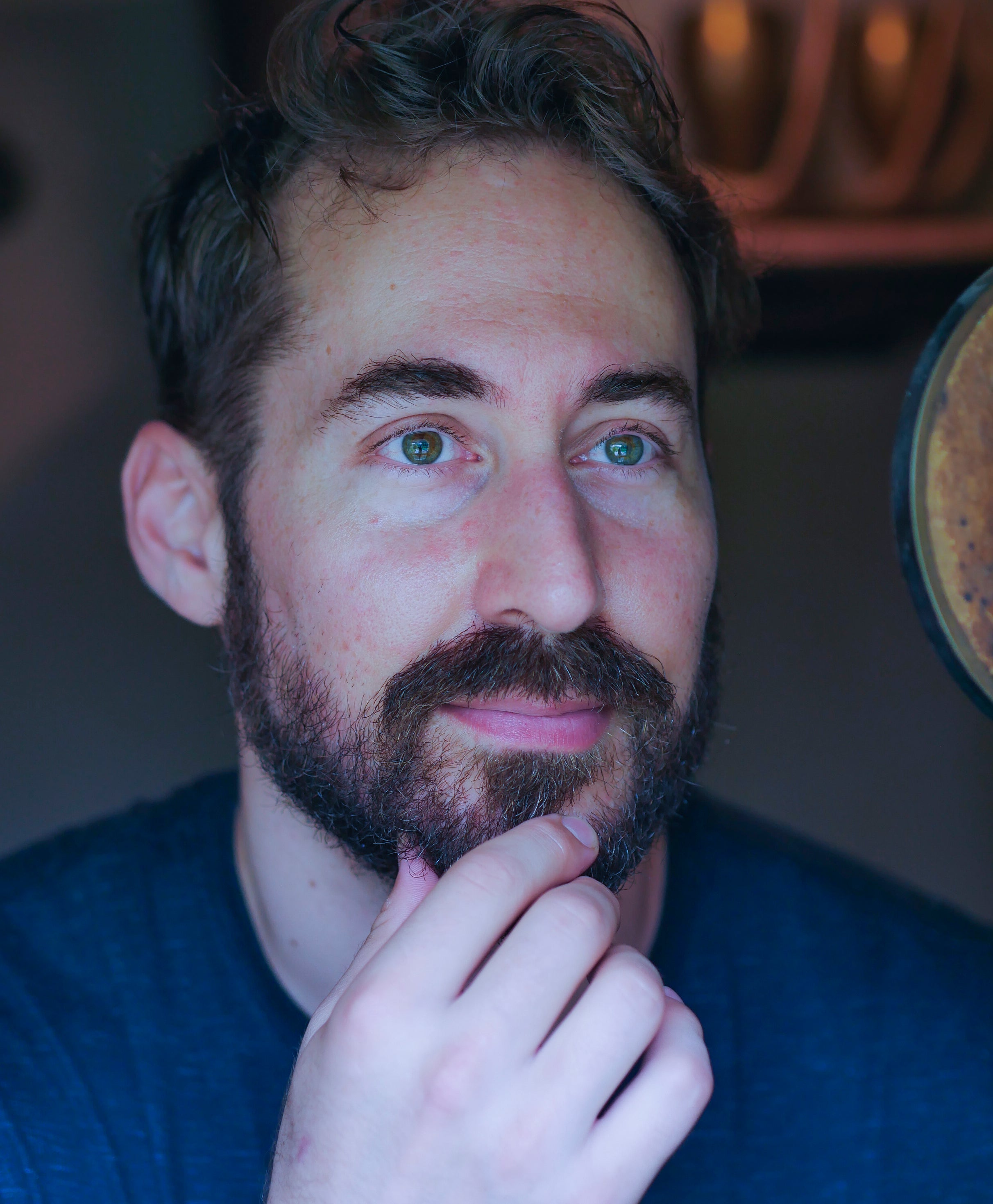 man with beard after putting on Evolution face serum