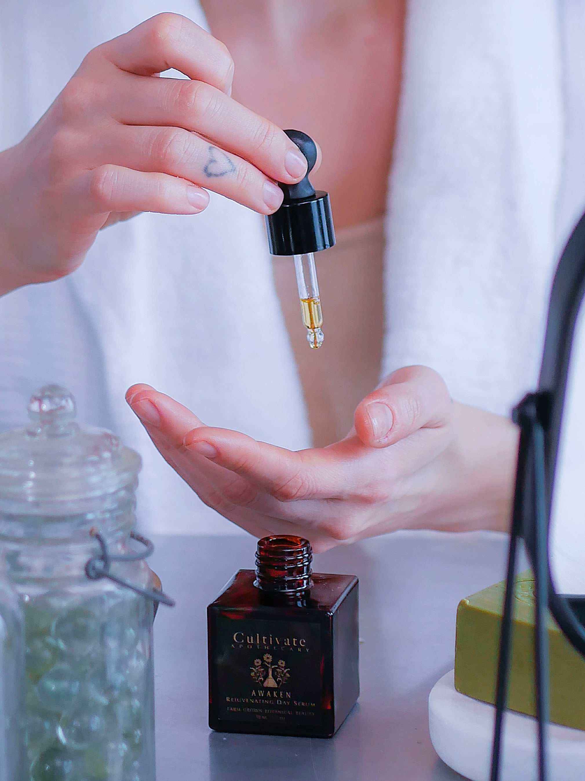 A woman using serums for sensitive skin.